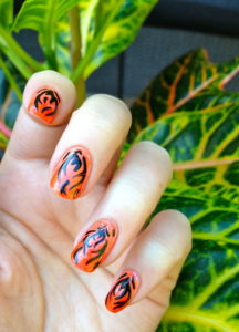 orange and black nail art
